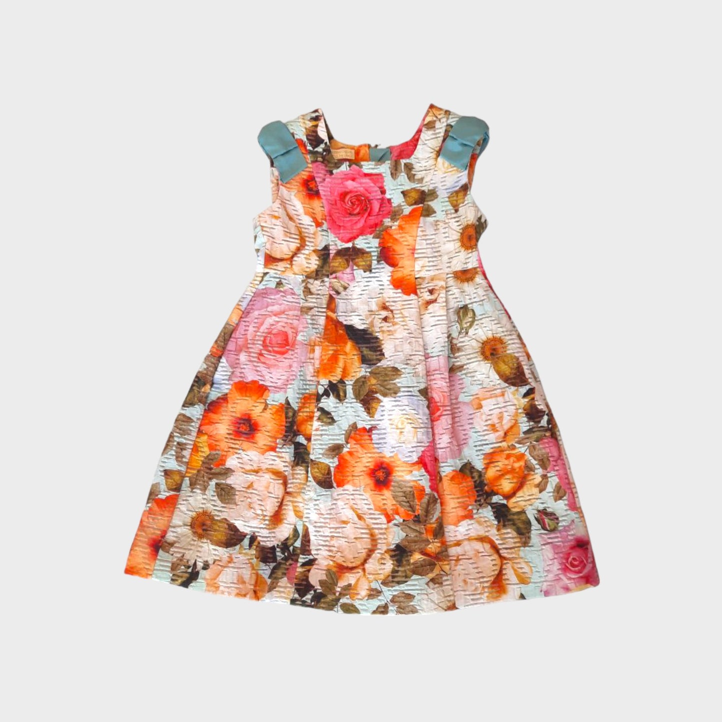 Vestito smanicato stampa fiori e fiocchi in contrasto