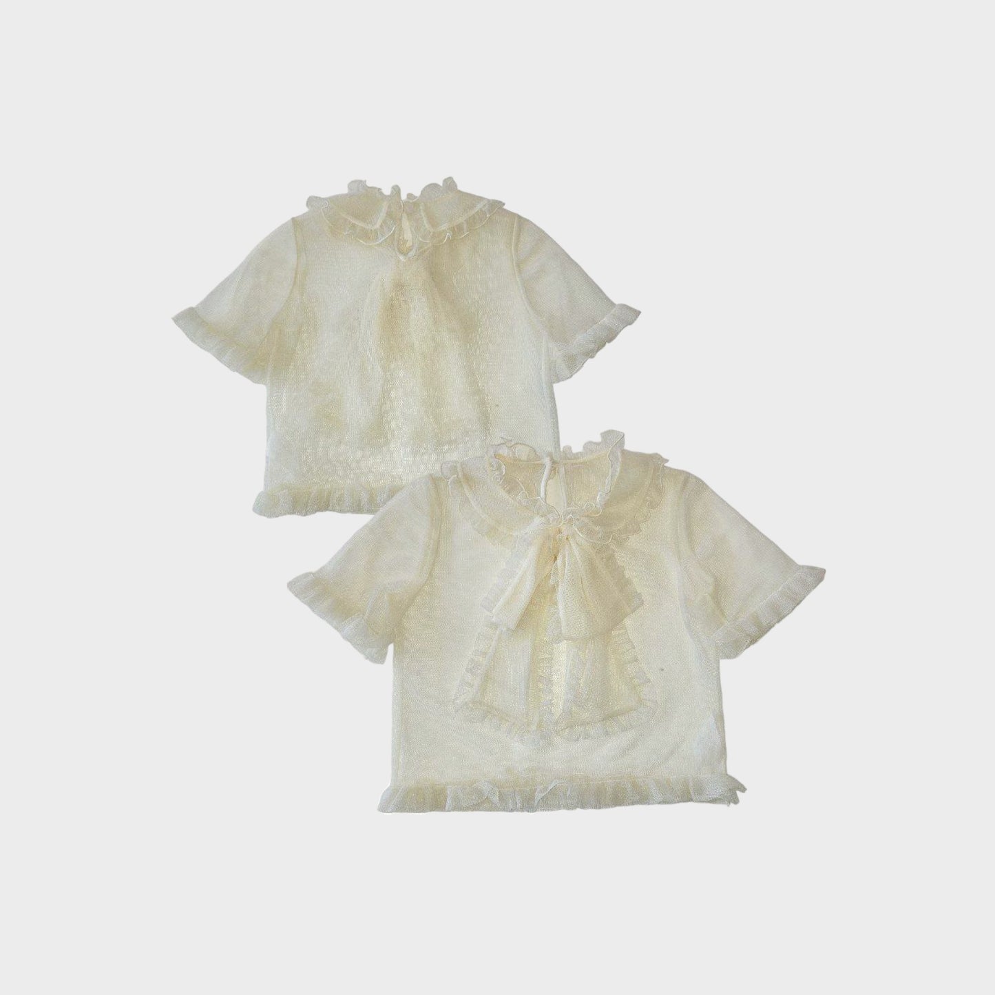 Camicia a manica corta in tulle con rouches e fiocco