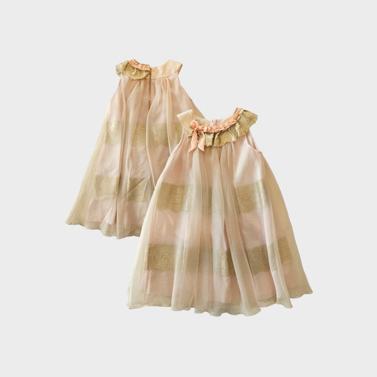 Vestito smanicato in organza di seta con balze in eco-pelle e fiocco