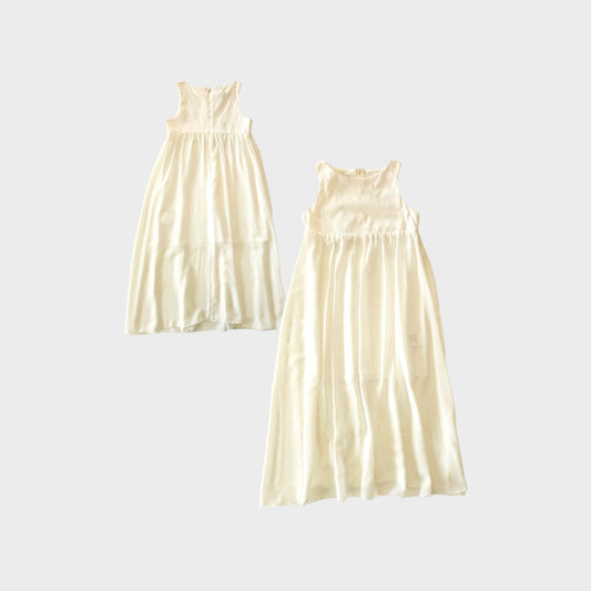 Vestito smanicato con parte gonna in tulle