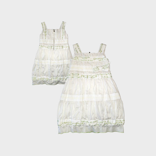 Vestito smanicato con ricami scritte su fettuccia in gros grain